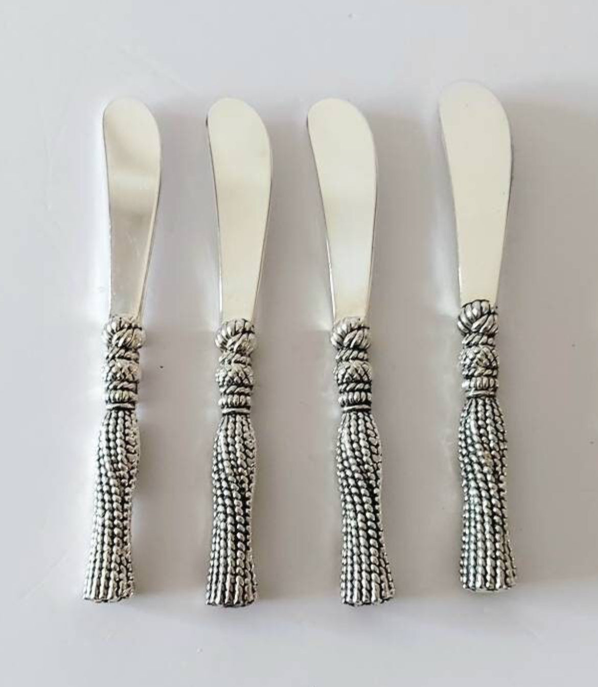 Spectacular Silver Plated “Robe” Butter Knife